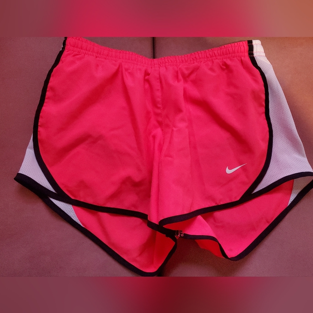 Hot pink Nike running short. Size M.